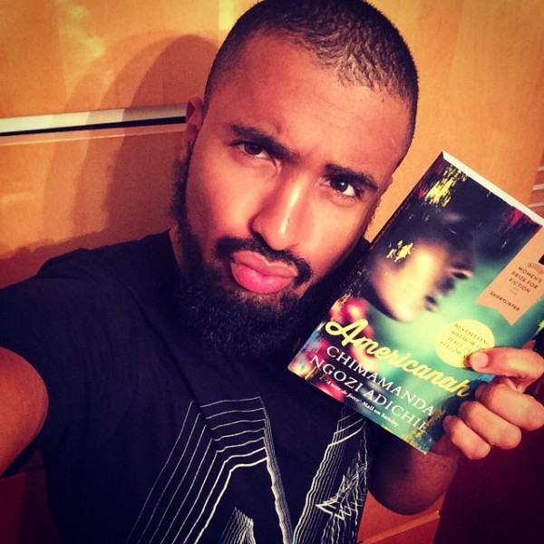 Of course, Purple Hibiscus is on the only book worthy of such a pout. (instragram via @malcolmmusic