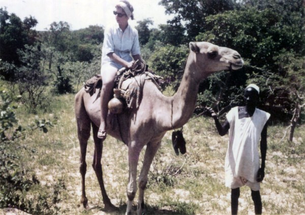 On the camel in Niger, with the camel herder in control, during the trip with Roger and John in 1963